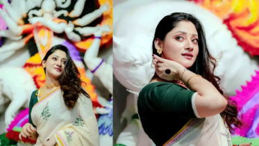 পূজার সাজে চিত্রনায়িকা পূজা চেরী